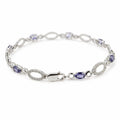 2.59 Ct Oval Blue Iolite Prong Silver Alternating Open Geometric Links with Lobster Clasp Link Bracelet by Fine Color Jewels