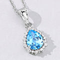 2.60 Ct Pear Swiss Blue Topaz & Lab Diamond Prong Silver Halo Teardrop Pendant Necklace by Fine Color Jewels