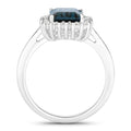 2.80 Ct Octagon London Blue Topaz and Lab Diamond Prong Silver Halo Ring by Fine Color Jewels