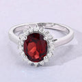 2 Ct Oval Red Mozambique Garnet and Lab Diamond Prong Silver Halo Ring by Fine Color Jewels