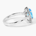 2 Ct Oval Swiss Blue Topaz and Lab Diamond Prong Silver Halo Ring by Fine Color Jewels
