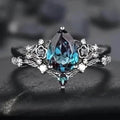 2-Piece Set: Gothic Black & Golden Engagement Ring Set with Pear-Shaped Cubic Zirconia by DailySale