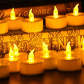 24-Piece: LED Flameless Tealight Smokeless Flickering Candles by DailySale