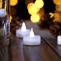 24-Piece: Warm White LED Tealight Flameless Smokeless Candles by DailySale