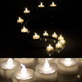 24-Piece: Warm White Tealights Timer Flameless Smokeless Candles by DailySale