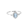 Blue oval Aquamarine Diamond Halo Ring by Fine Color Jewels