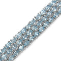 26.20 Ct Oval Sky Blue Topaz Prong Sterling Silver Triple Row Tennis Bracelet by Fine Color Jewels
