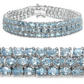 26.20 Ct Oval Sky Blue Topaz Prong Sterling Silver Triple Row Tennis Bracelet by Fine Color Jewels