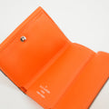 Louis Vuitton Orange Taigarama Discovery Compact Mini Wallet #2952 by Bolt Boutique