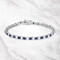 6.87 ct. t.w. Blue Sapphire and White Topaz Bracelet in Sterling Silver by Bids.com