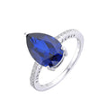 3.50 Ct Pear Lab Created Blue Sapphire Prong Silver Cocktail Pave-set Ring by Fine Color Jewels
