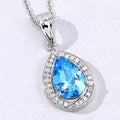 3.50 Ct Pear Swiss Blue Topaz and Lab Diamond prong Silver Halo teardrop pendant Necklace by Fine Color Jewels