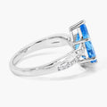 3.50 Ct Pear Swiss Blue Topaz & Lab Diamond Prong Silver Pave Bypass Ring by Fine Color Jewels