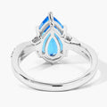 3.50 Ct Pear Swiss Blue Topaz & Lab Diamond Prong Silver Pave Bypass Ring by Fine Color Jewels