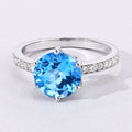 3.75 Ct Round Swiss Blue Topaz and Lab Diamond Prong Silver Pave Bridge Ring by Fine Color Jewels