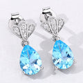 3.80 Ct Pear Swiss Blue Topaz & Lab Diamond Prong Silver Teardrop Dangle Earrings by Fine Color Jewels