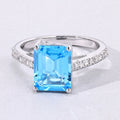 3.89 Ct Octagon Swiss Blue Topaz & Lab Diamond Prong Silver Pave Bridge Ring by Fine Color Jewels