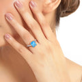 3.89 Ct Octagon Swiss Blue Topaz & Lab Diamond Prong Silver Pave Bridge Ring by Fine Color Jewels
