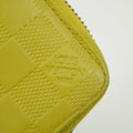 Louis Vuitton Yellow Damier Infini Zippy Wallet #3095 by Bolt Boutique