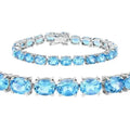 35.20 Ct Oval Swiss Blue Topaz Prong Sterling Silver Tennis Bracelet by Fine Color Jewels
