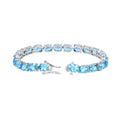 35.20 Ct Oval Swiss Blue Topaz Prong Sterling Silver Tennis Bracelet by Fine Color Jewels