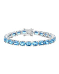 35.20 Ct Oval Swiss Blue Topaz Prong Sterling Silver Tennis Bracelet by Fine Color Jewels