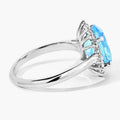 4 Ct Oval Swiss Blue Topaz and Lab Diamond Prong Silver Halo Ring by Fine Color Jewels