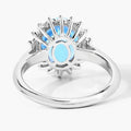 4 Ct Oval Swiss Blue Topaz and Lab Diamond Prong Silver Halo Ring by Fine Color Jewels