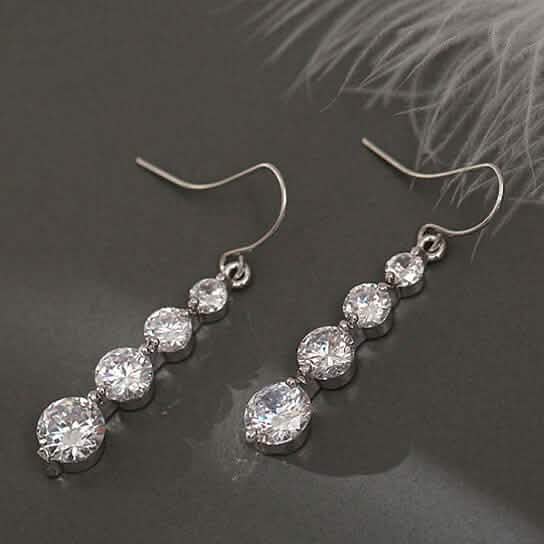 4 Row Graduated Crystal Drop Earrings by DailySale