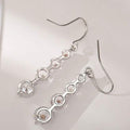 4 Row Graduated Crystal Drop Earrings by DailySale