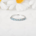 Blue Topaz Half Eternity Ring by Fine Color Jewels