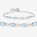 Oval Blue Topaz Prong Silver Infinity Bolo Adjustable Bracelet by Fine Color Jewels