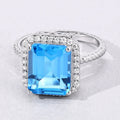 5.45 Ct Octagon Swiss Blue Topaz and Lab Diamond Prong Silver Halo Ring by Fine Color Jewels