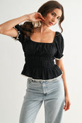 Smocked Peplum Top With Puff Sleeves by Boutique 23