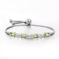 Oval Green Peridot Prong Two-Tone Gold Plated Silver Infinity Bolo Adjustable Bracelet by Fine Color Jewels