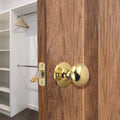 Design House Cambridge 2-Way Latch Passage Door Knob Polished Brass by Deal US