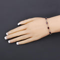 Oval Deep Red Garnet Prong Two-Tone Gold Plated Silver Infinity Bolo Adjustable Bracelet by Fine Color Jewels