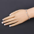 Oval Blue Aquamarine Prong Two-Tone Gold Plated Silver Infinity Bolo Adjustable Bracelet by Fine Color Jewels