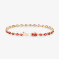 7.00 Ct Oval Orange Sapphire Prong 14K Yellow Gold Inline Tennis Bracelet by Fine Color Jewels