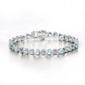7.50 Ct Heart Blue Topaz & Diamond Prong Silver Tennis Bracelet by Fine Color Jewels