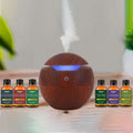 7-Piece: Ultrasonic Cool Mist Wood-Look Aroma Diffuser with Essential Oils by DailySale