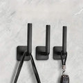 4-Pack: Adhesive Toilet Paper Holder, Wall Mount, White & Black by DailySale
