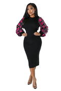 Knit Dress with Puff Sequin Sleeves by The House of Stylez