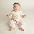 graphic bodysuit | treat people with kindness by Finn + Emma