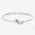 Oval Blue Topaz Prong Silver Infinity Bolo Adjustable Bracelet by Fine Color Jewels