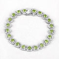 9.24 Ct Heart Green Peridot & Diamond Prong Silver Tennis Bracelet by Fine Color Jewels