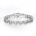 7.50 Ct Heart Blue Topaz & Diamond Prong Silver Tennis Bracelet by Fine Color Jewels