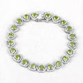 9.24 Ct Heart Green Peridot & Diamond Prong Silver Tennis Bracelet by Fine Color Jewels