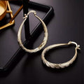 925 Sterling Silver Oval Filigree Hoop Earrings by DailySale