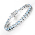 Heart Sky Blue Topaz Prong Silver Tennis Bracelet by Fine Color Jewels